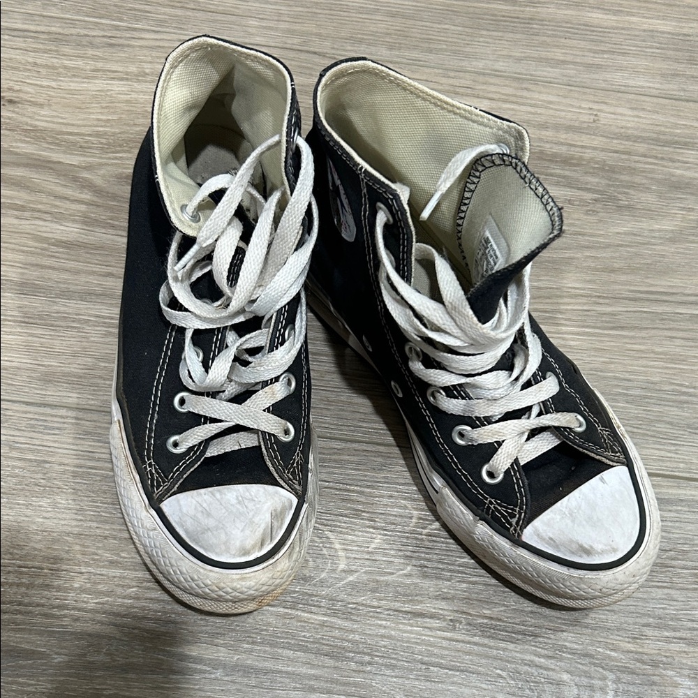 Black and White High-Top Converse Chuck Taylor Sneakers
